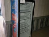 an image of a soda cooler in a commercial kitchen
