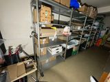 a room with a lot of boxes and boxes on the shelves