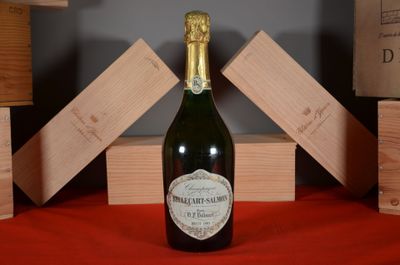 a bottle of wine that is sitting on a table