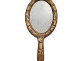 miroir en forme de miroir à main orné d'un motif de feuilles
