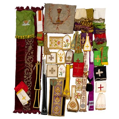 many different types of cloths laid out on a white surface