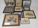 a lot of framed pictures on the table together
