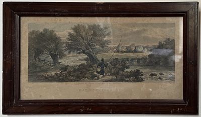 tableau encadré représentant un homme et un chien dans un paysage