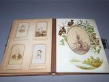 an old book with pictures of people and birds on it