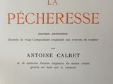 a close up of a book on a table with a red and white cover