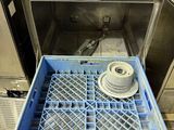 a dishwasher with a drainer in it in a kitchen
