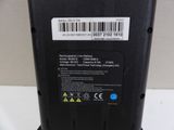 a close up of a battery on a white surface