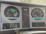 a dashboard of a car with various gauges and numbers