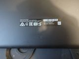 a close up of a laptop with a sticker on it