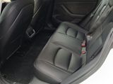the back seats of a car are empty in the parking lot