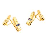 une paire de boucles d'oreilles en or ornées de pierres bleues