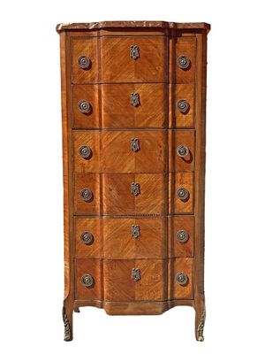 an image of a tall chest of drawers with drawers