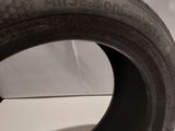 a close up of a tire on a white surface with a white background