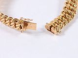 gold plated bracelet with a chain link and a clasp