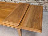a wooden table with two pieces of wood on top of it