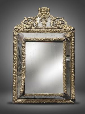 MIROIR à pareclose de style Louis XIV, à décor d'un mascaron