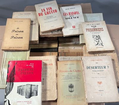 several books are stacked on top of each other on a table