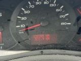 a close up of a car dashboard with a speedometer