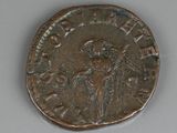 an old coin with a picture of a man on it
