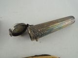 a knife and a spoon sitting on a table
