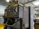 a machine that is sitting inside of a building