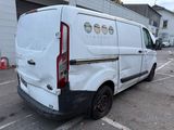 a white van that is parked in a parking lot