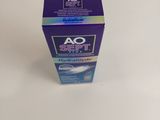 a box of toothpaste sitting on a white surface