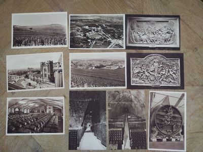 several black and white photographs of a wooden table with pictures on it
