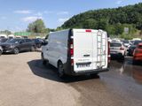 a white van that is parked in a parking lot
