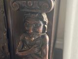 a statue of a woman holding a baby on her lap