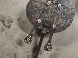 a metal object that is sitting on the ground