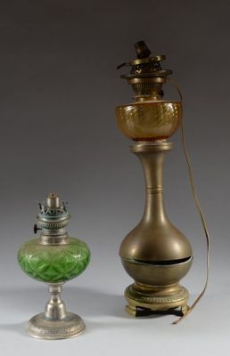 two lamps that are sitting next to each other on a table