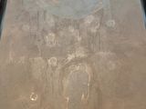 a picture of a painting on the wall of a building