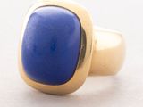 gold and lapis ring with a lapis stone in the center