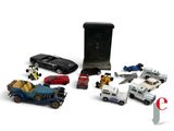 many toy cars that are sitting next to each other
