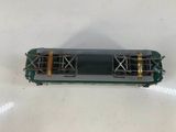 a toy train on a white table with a white background