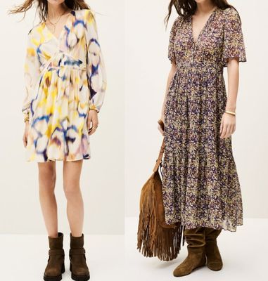 two women in dresses and boots standing next to each other