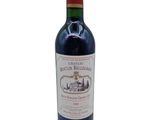a bottle of wine that is sitting on a table