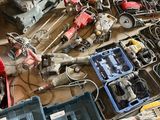 a lot of tools that are sitting on the floor