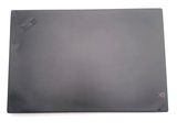 the back of a laptop with a mouse on top of it