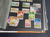 a lot of stamps that are on the table