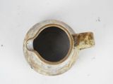a coffee cup that is sitting on a table