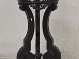 a black table with a black top and a black base