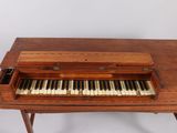 a piano that is sitting on top of a table