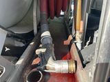 a red substance on the floor of a truck