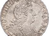 une pièce d'argent portant une tête de femme et une couronne