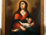 an image of a painting of a woman holding a child