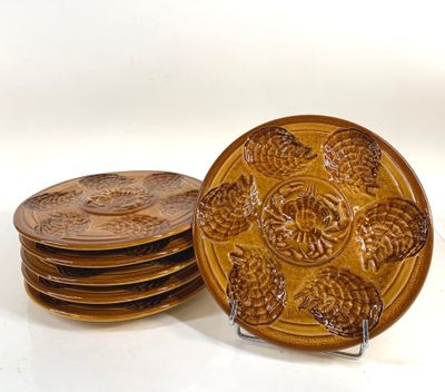 four plates that are sitting on top of each other