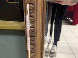 a person taking a picture of themselves in a mirror