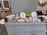 a table with a lot of plates and cups on it